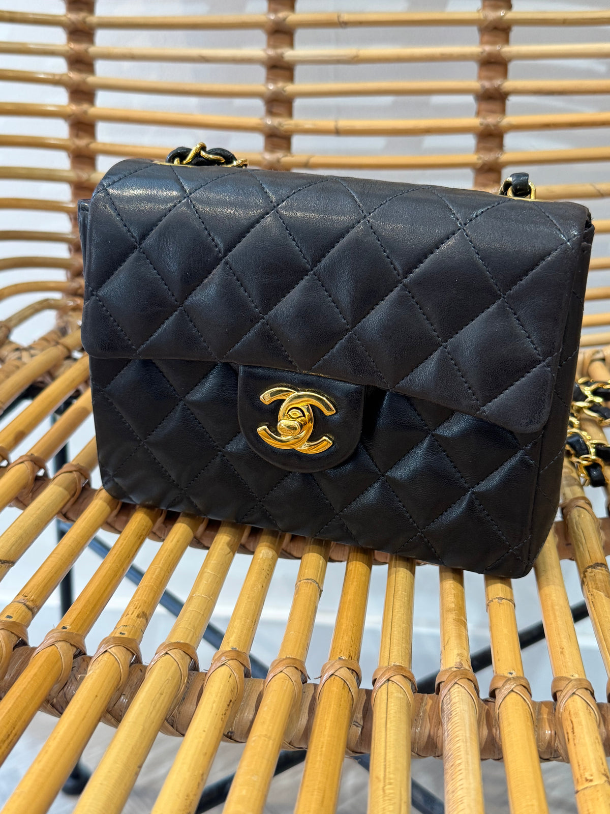 Chanel vintage mini classic flap bag Black and Gold